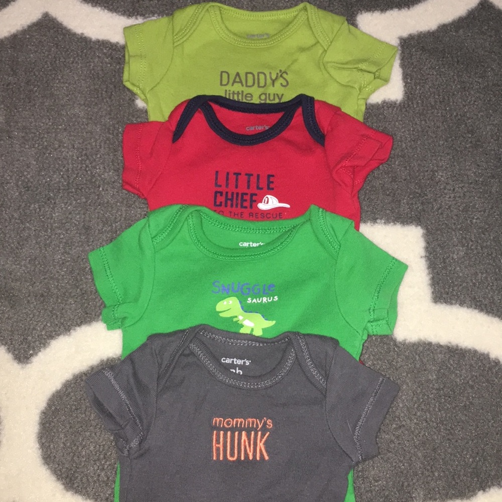 4 Carter’s NB short sleeve onesies